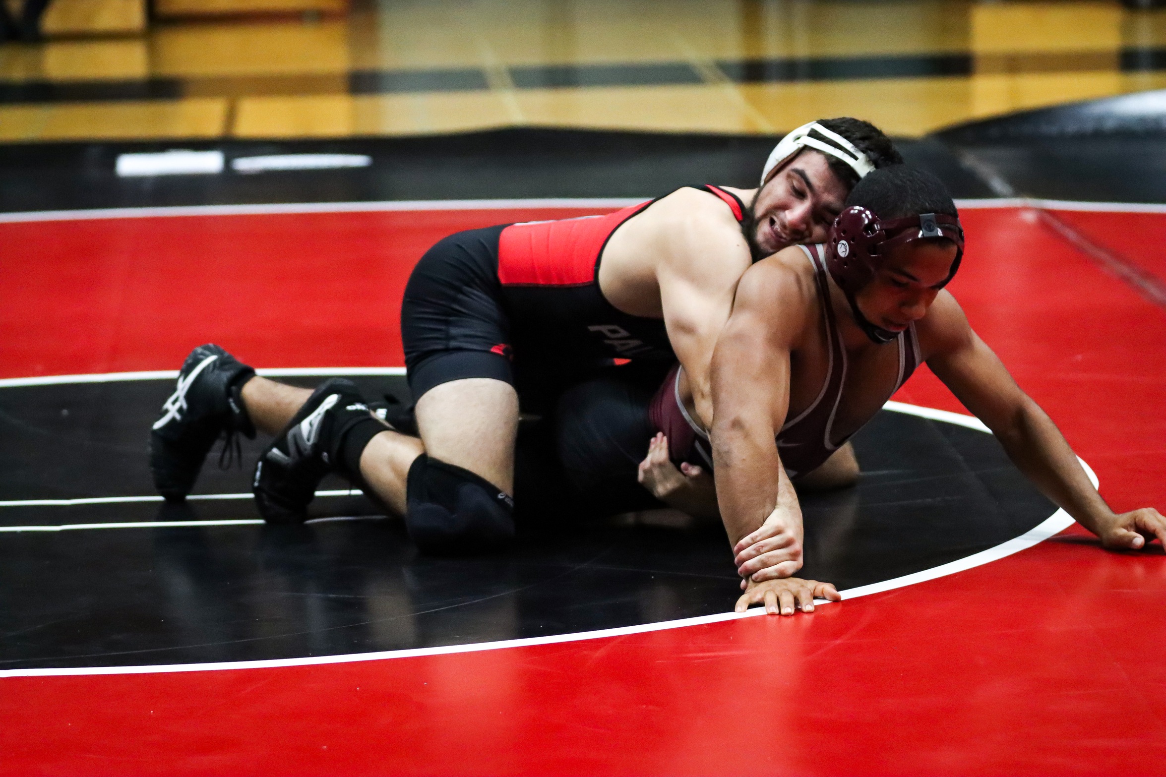 DJ Weimer won his match during the Consolation/Semis against Santa Ana College. Photo by Cara Heise.