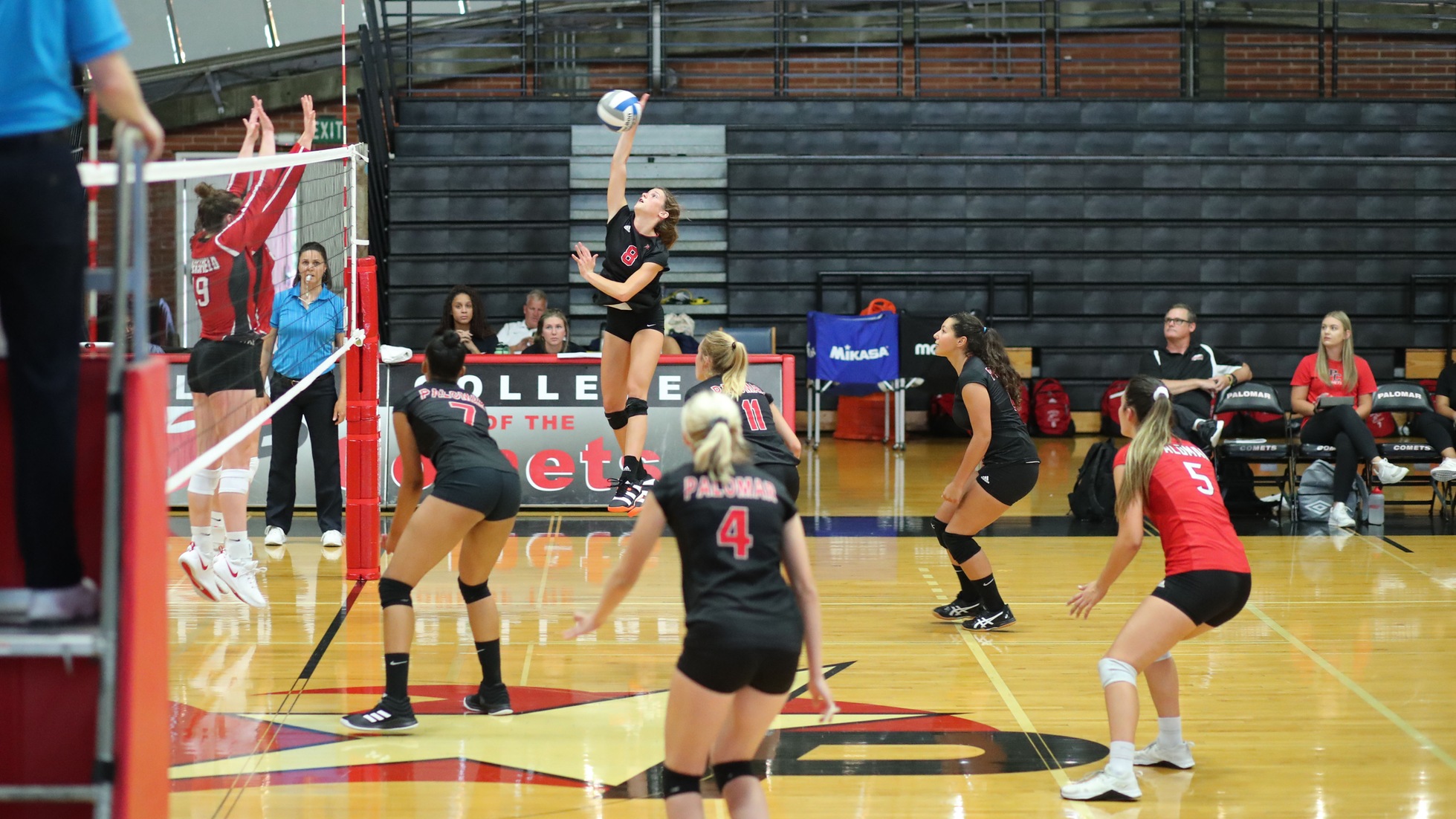 Carsyn Emerson with a kill in set three against Bakersfield. Photo by Hugh Cox.