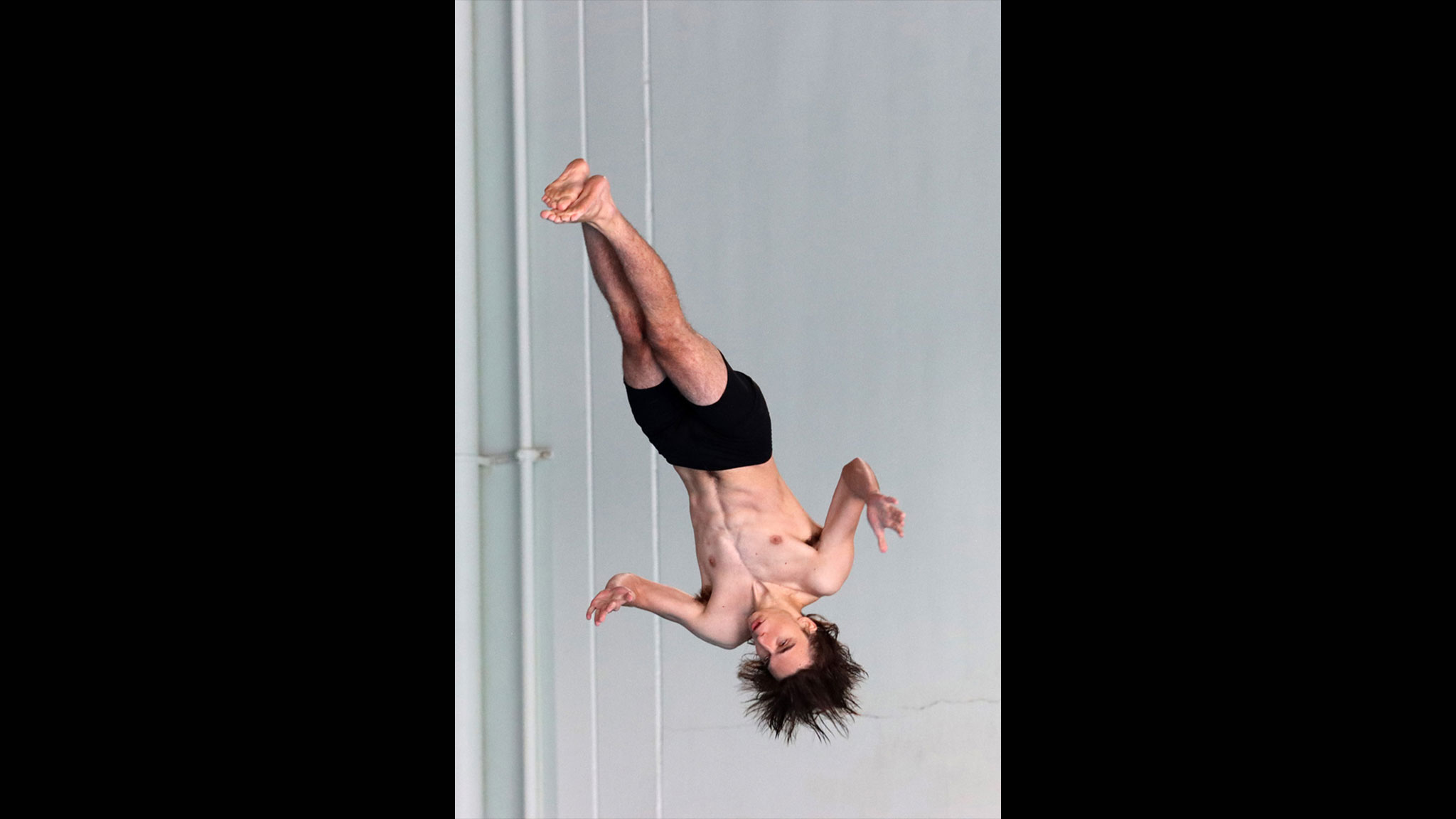 Taylor diving champ, men finish in 7th