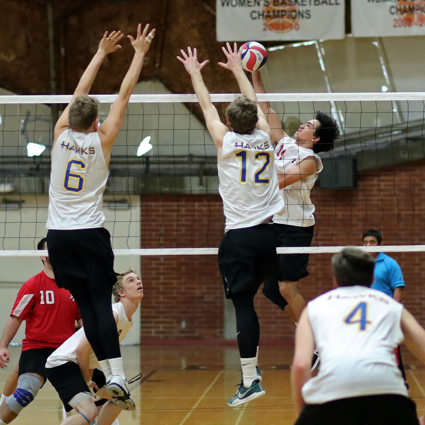 This kill by #14 Bradley Polancic gave us a 3 point lead (13 to 10) in the second game which we won with a score of 25 to 18. Photo by Hugh Cox.
