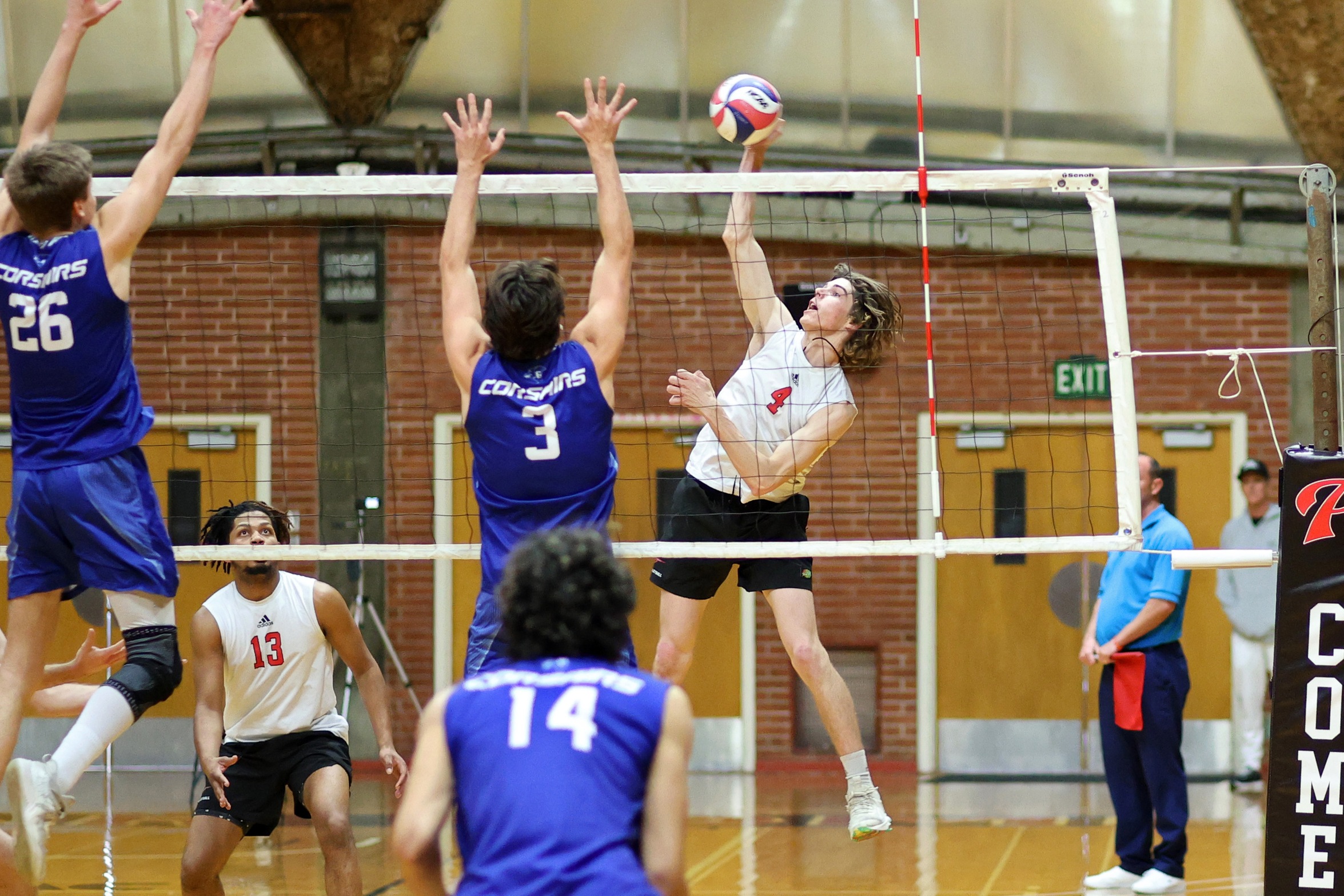 Aiden Scripps finished with 12 digs against Santiago Canyon College. Photo by Hugh Cox.