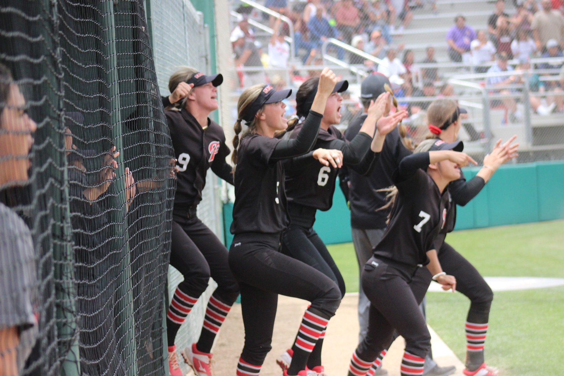 The team cheers as Kendall Kates' RBI single tied the game against Mt. SAC.