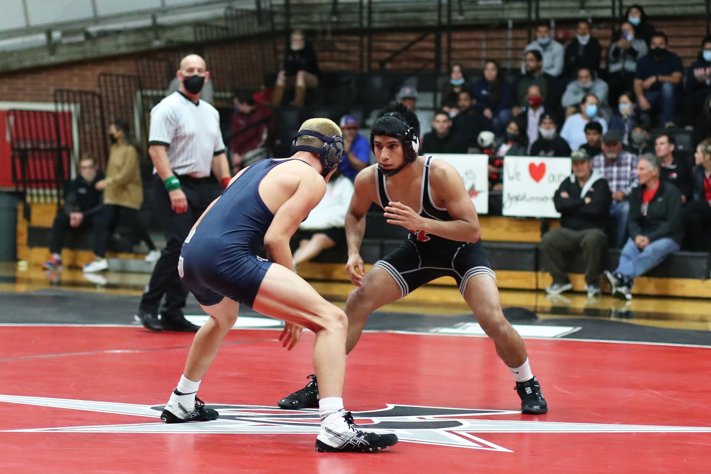 Juan Diaz wrestles in the 125 lb. weight class. He currently has an honorable mention honor. Photo by Hugh Cox.