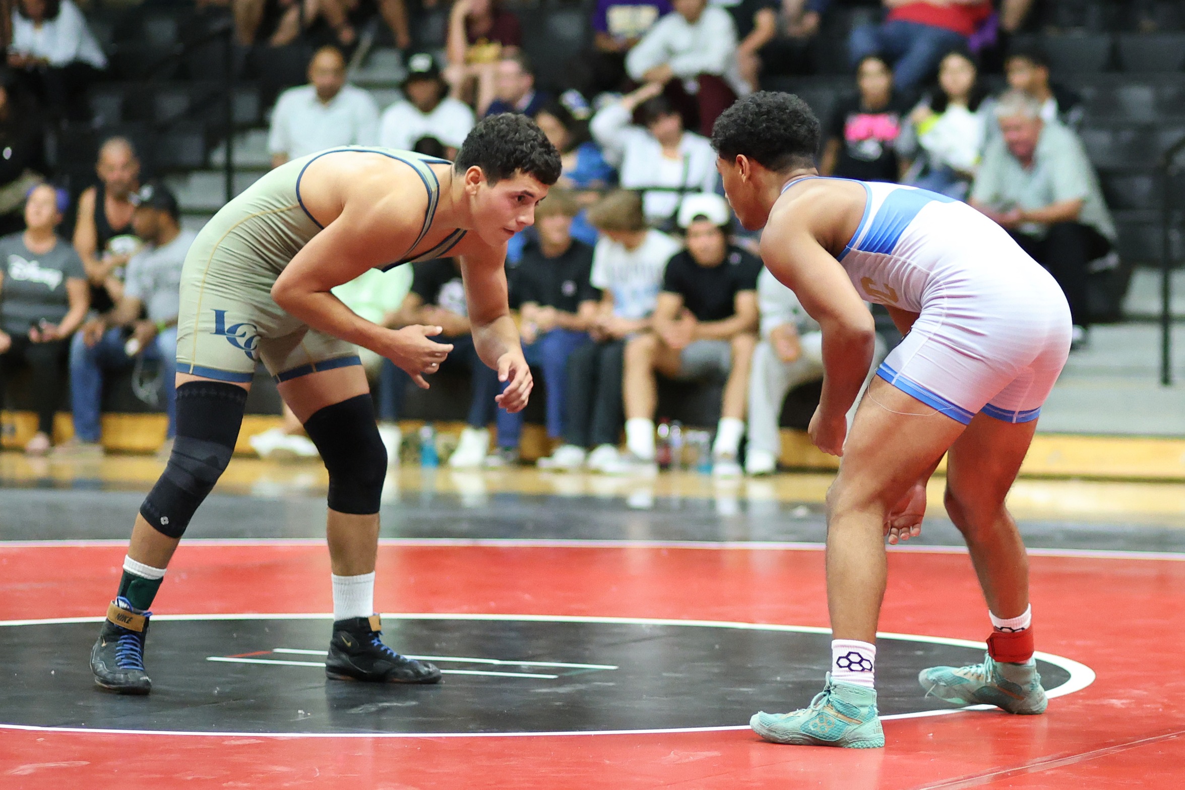 Anthony Perez (left) won by technical fall (22-5) in the Victor Valley College dual. Perez is currently ranked No. 6. Photo by Hugh Cox.