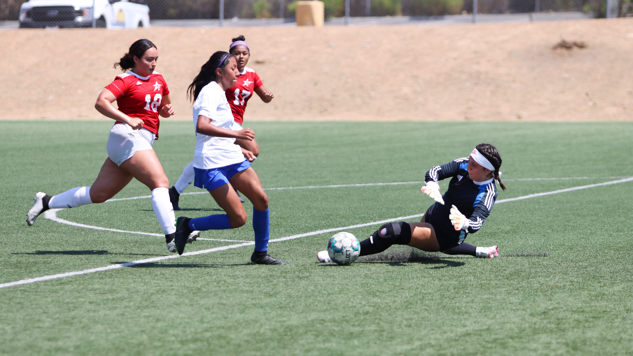 Goalkeeper Sayra Gamboa saves a goal by L.A. City College in the first half. Photo by Cara Heise.