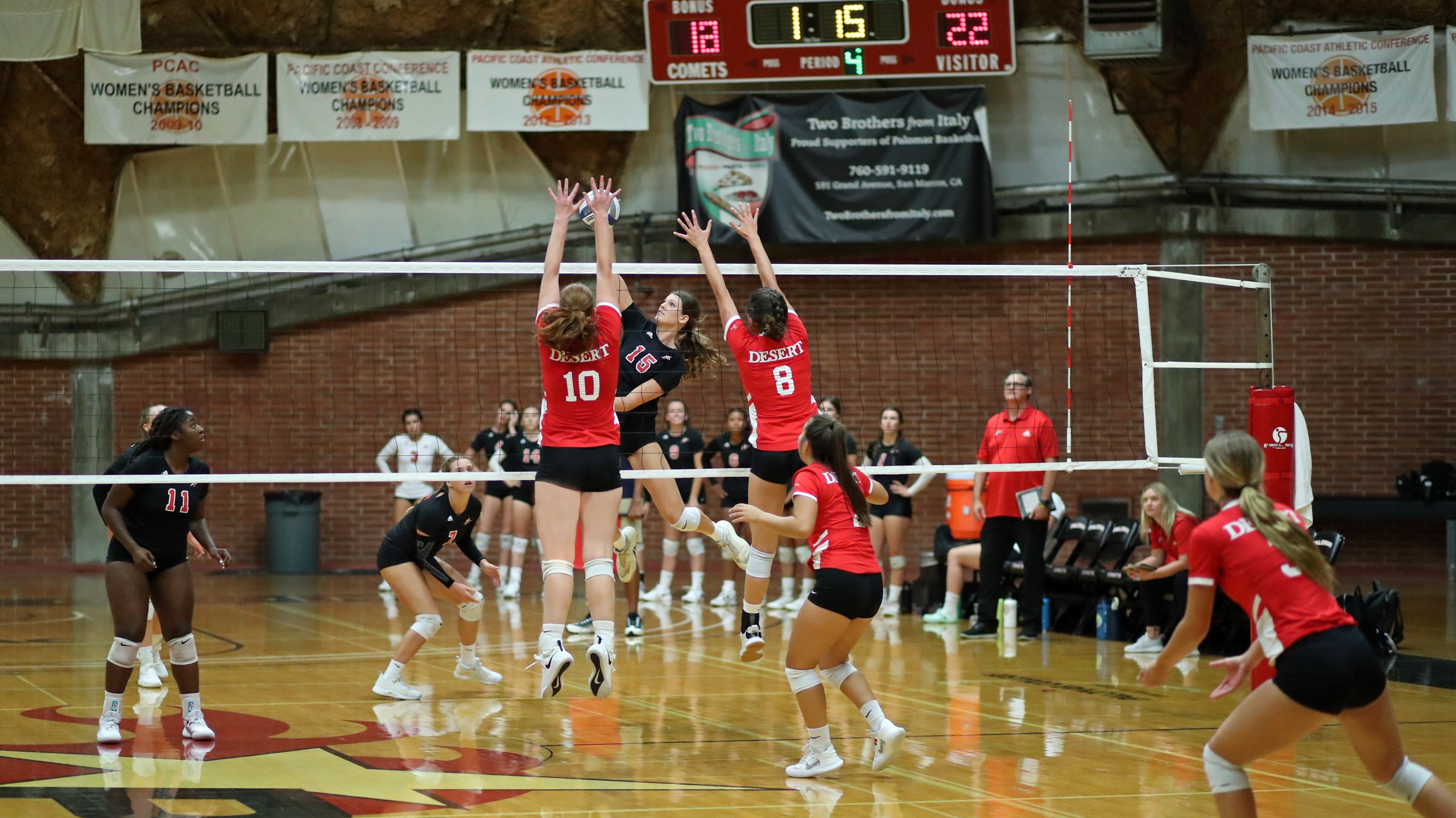 Savanna Lewis kills the ball against the Roadrunners in the fourth set. Photo by Hugh Cox.