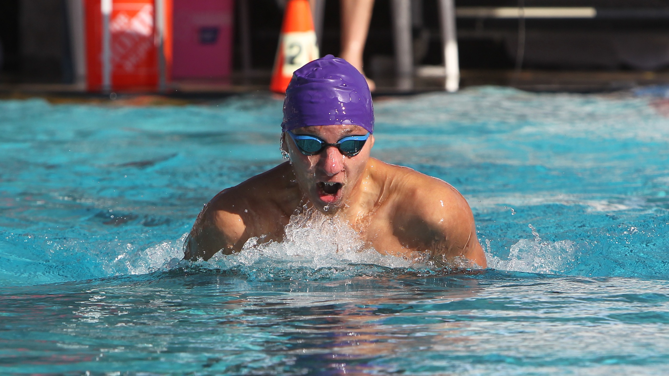 Timothy Godin finished in third place for the 100-yard IM. Photo by Hugh Cox.